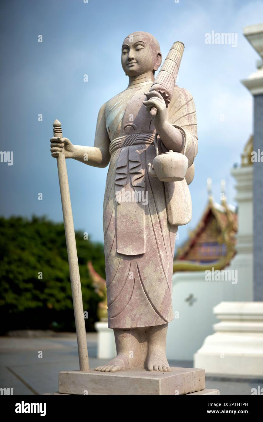 monk-statue-thailand-travelling-monk-equipped-with-walking-staff-traditional-alms-bowl-and-umbrella-2ATHTPH.jpg